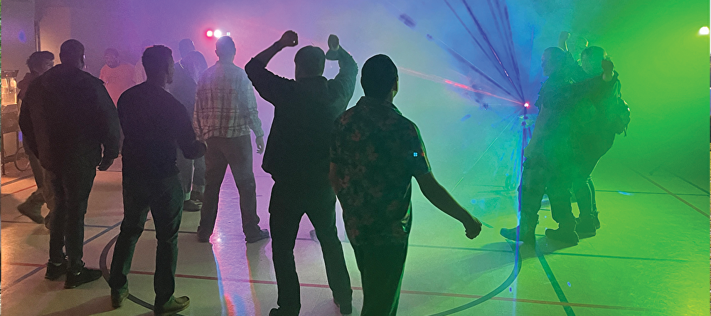 group of young people at a dance
